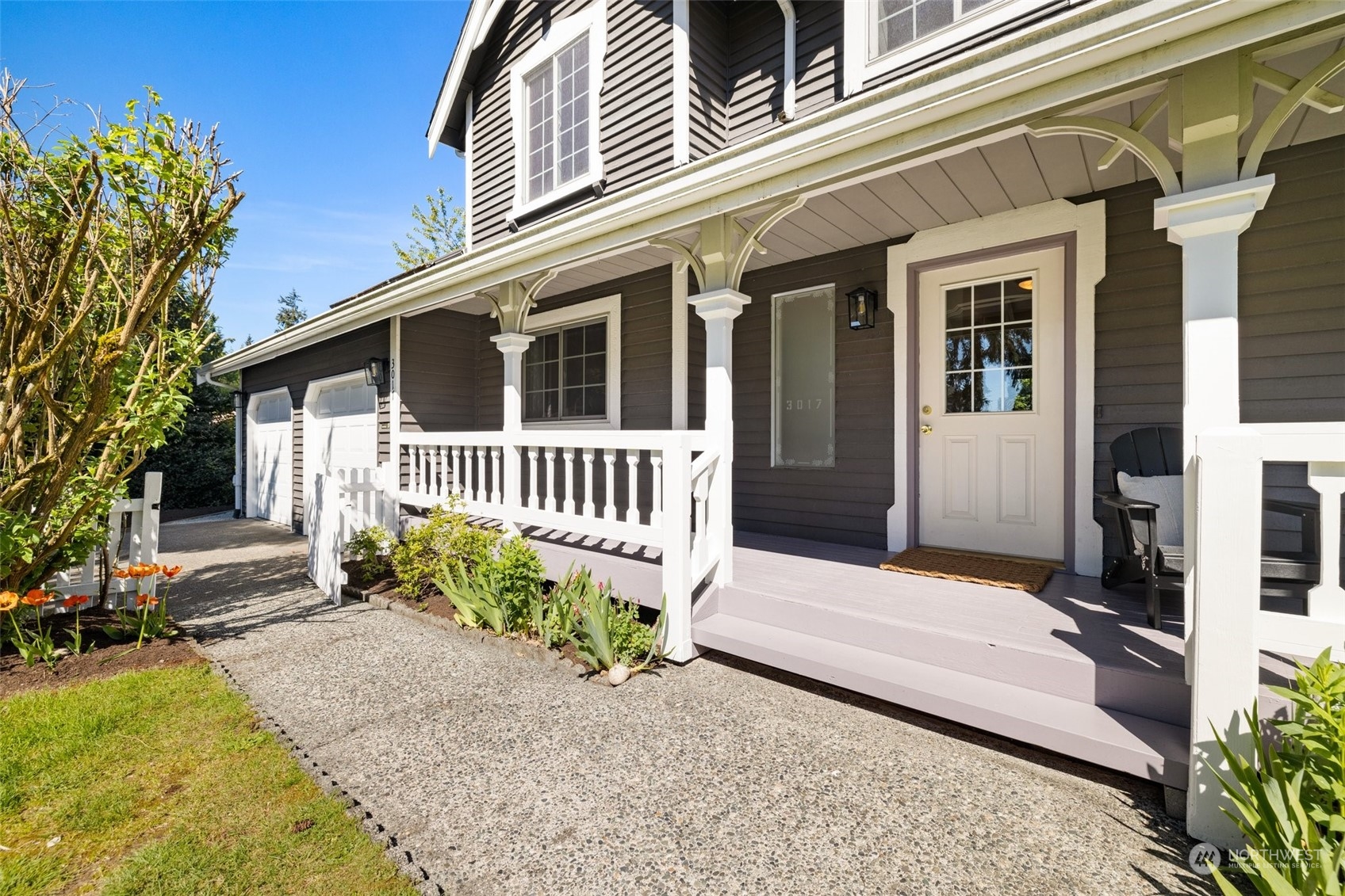 3017 166th Place Southeast Bothell, WA 98012 - Photo 3 of 28 a view of a house with a yard