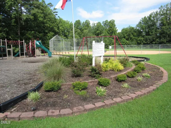a view of a park with slide