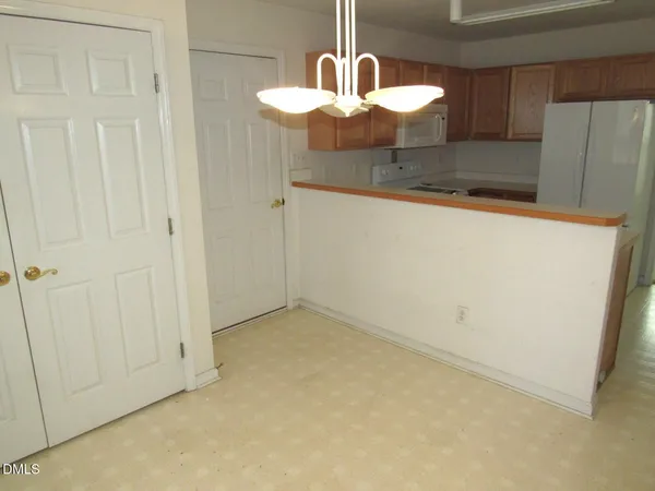 a view of a kitchen with a sink