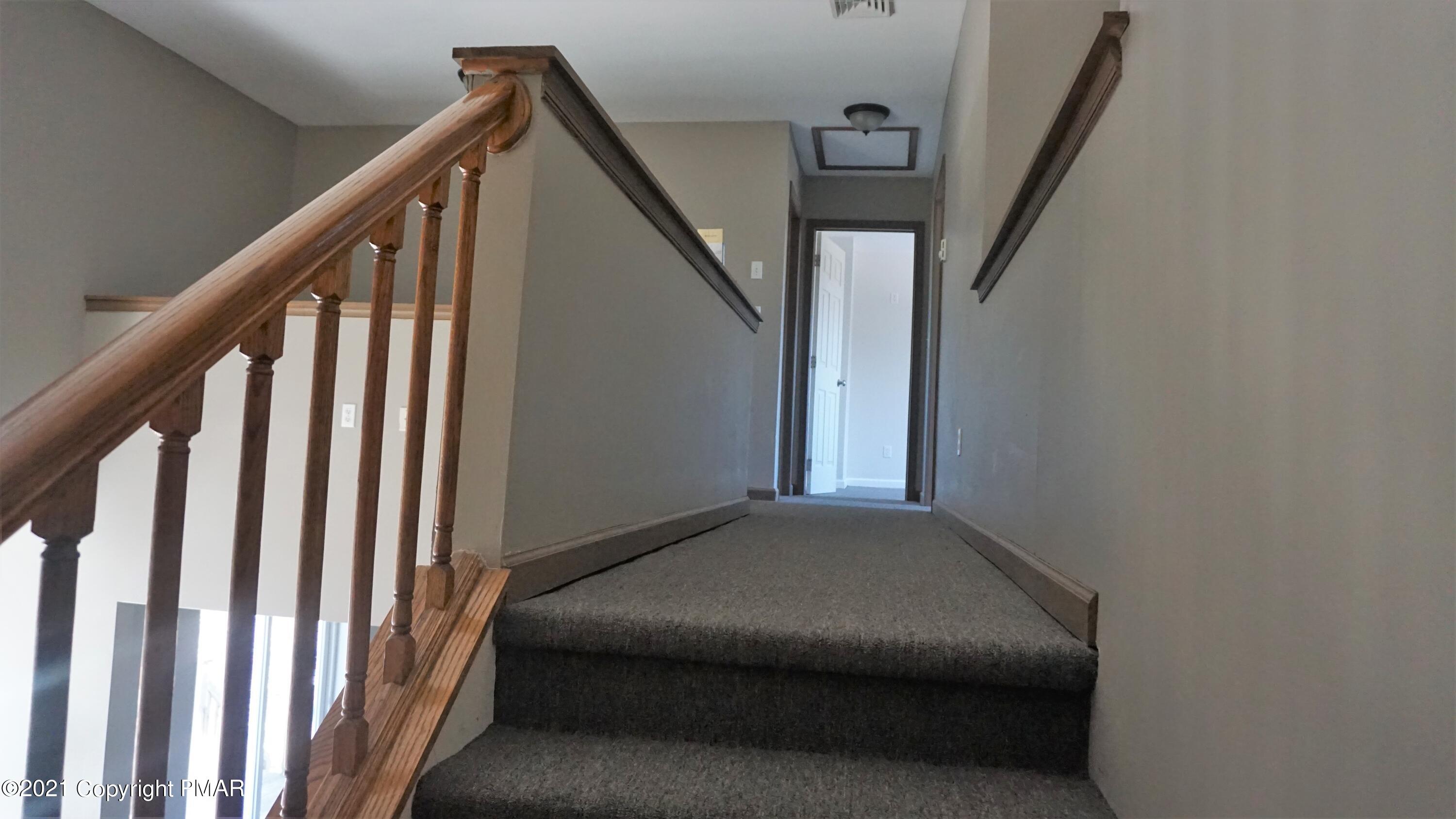 398 Gold Finch Road Bushkill, PA 18324 - Photo 15 of 24 a view of livingroom with stairs