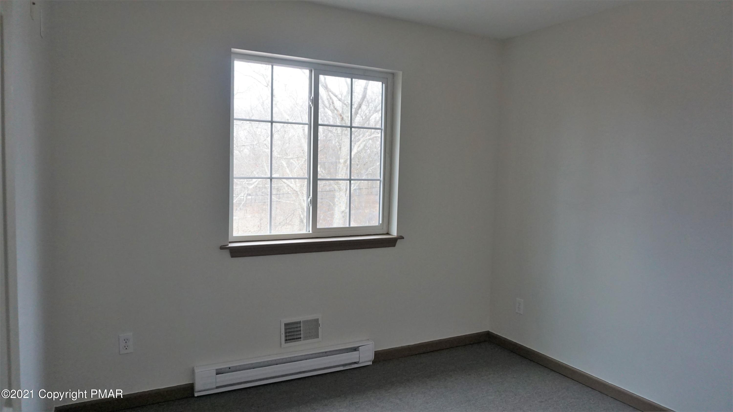 398 Gold Finch Road Bushkill, PA 18324 - Photo 16 of 24 an empty room with a window
