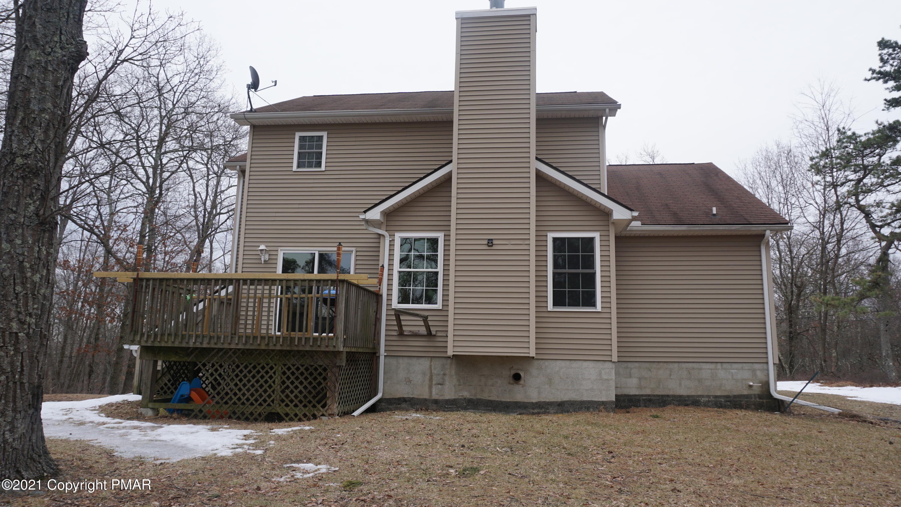 398 Gold Finch Road Bushkill, PA 18324 - Photo 23 of 24 a view of backyard of house
