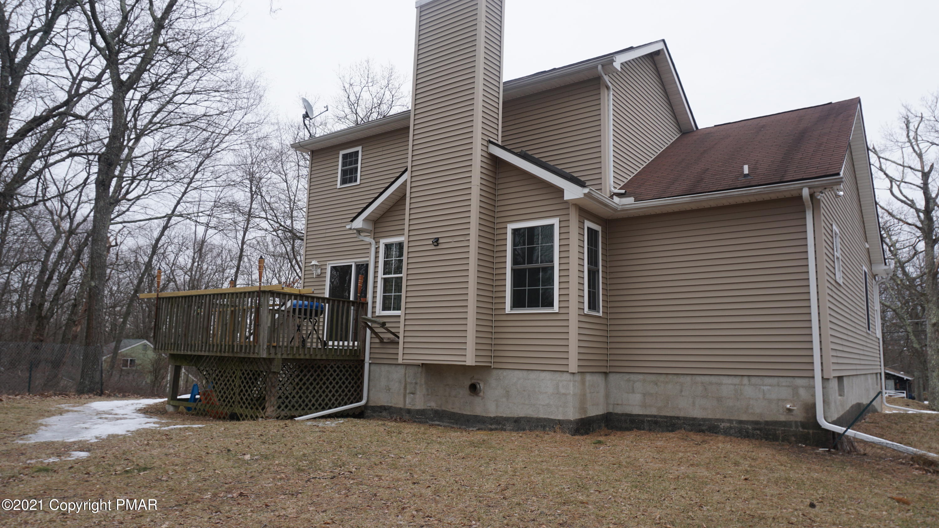 398 Gold Finch Road Bushkill, PA 18324 - Photo 24 of 24 a view of a house with a yard
