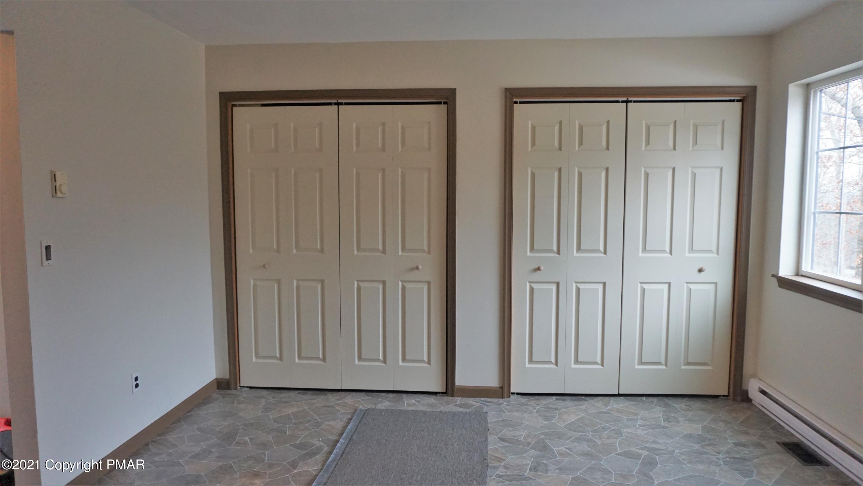 398 Gold Finch Road Bushkill, PA 18324 - Photo 7 of 24 an empty room with windows