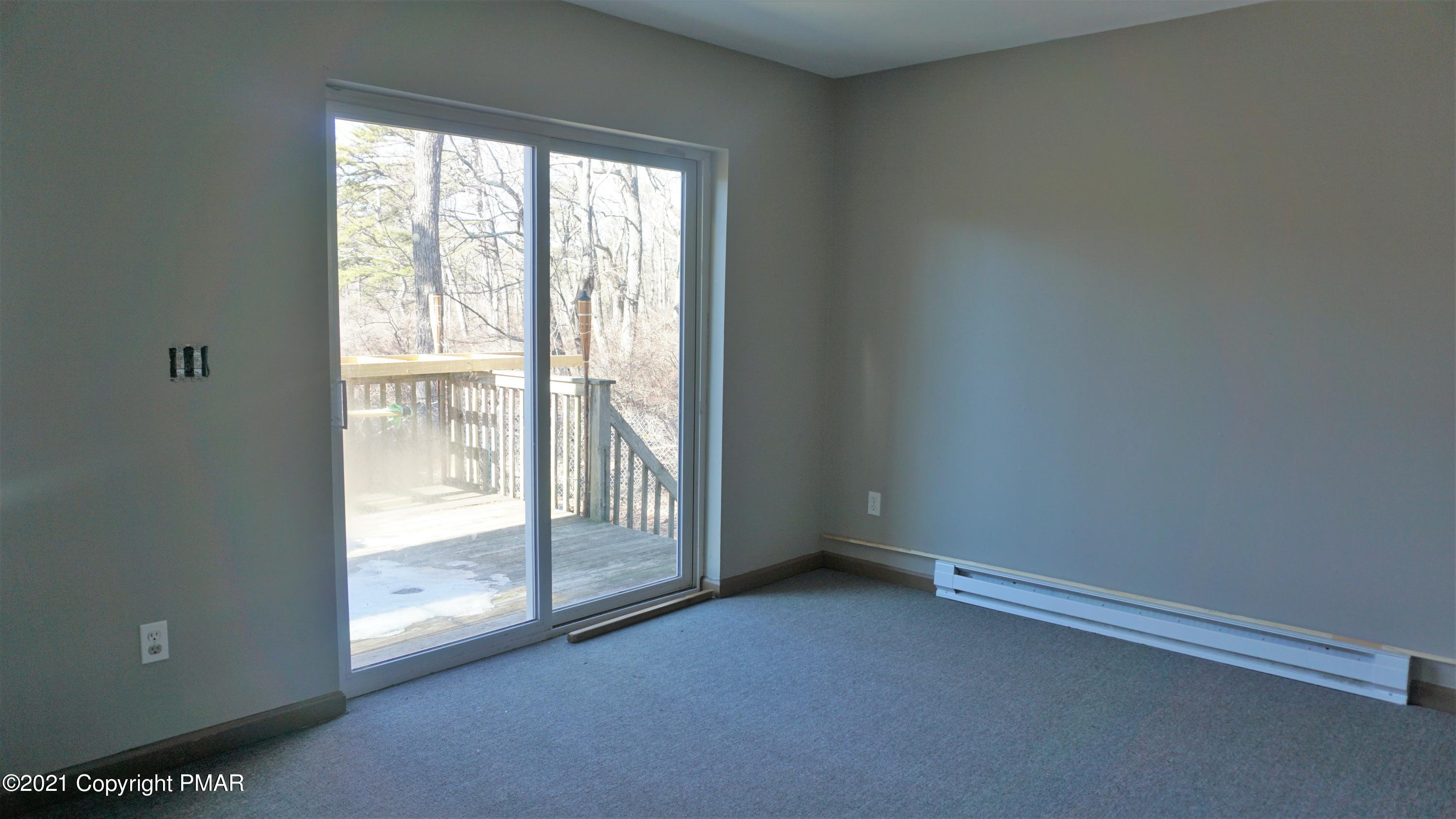 398 Gold Finch Road Bushkill, PA 18324 - Photo 10 of 24 a view of an empty room with a window