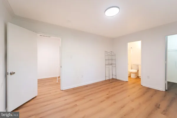 a view of a room with racks on the wall