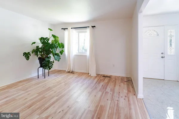 an empty room with windows