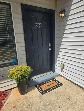 a view of entryway with wooden floor