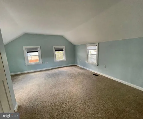 a view of a window in an empty room with a window