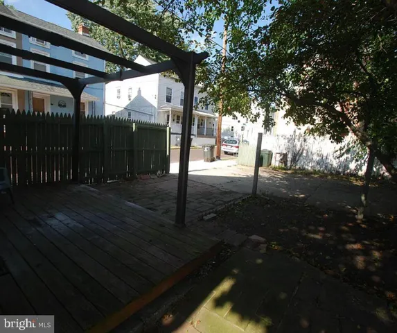 a view of backyard with green space