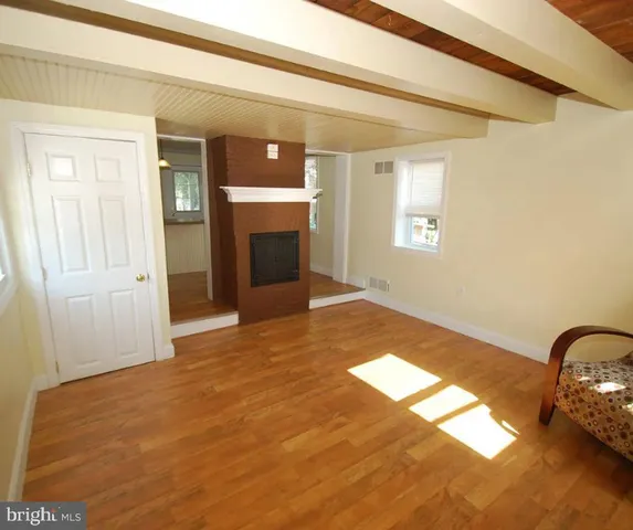 a view of an empty room and window
