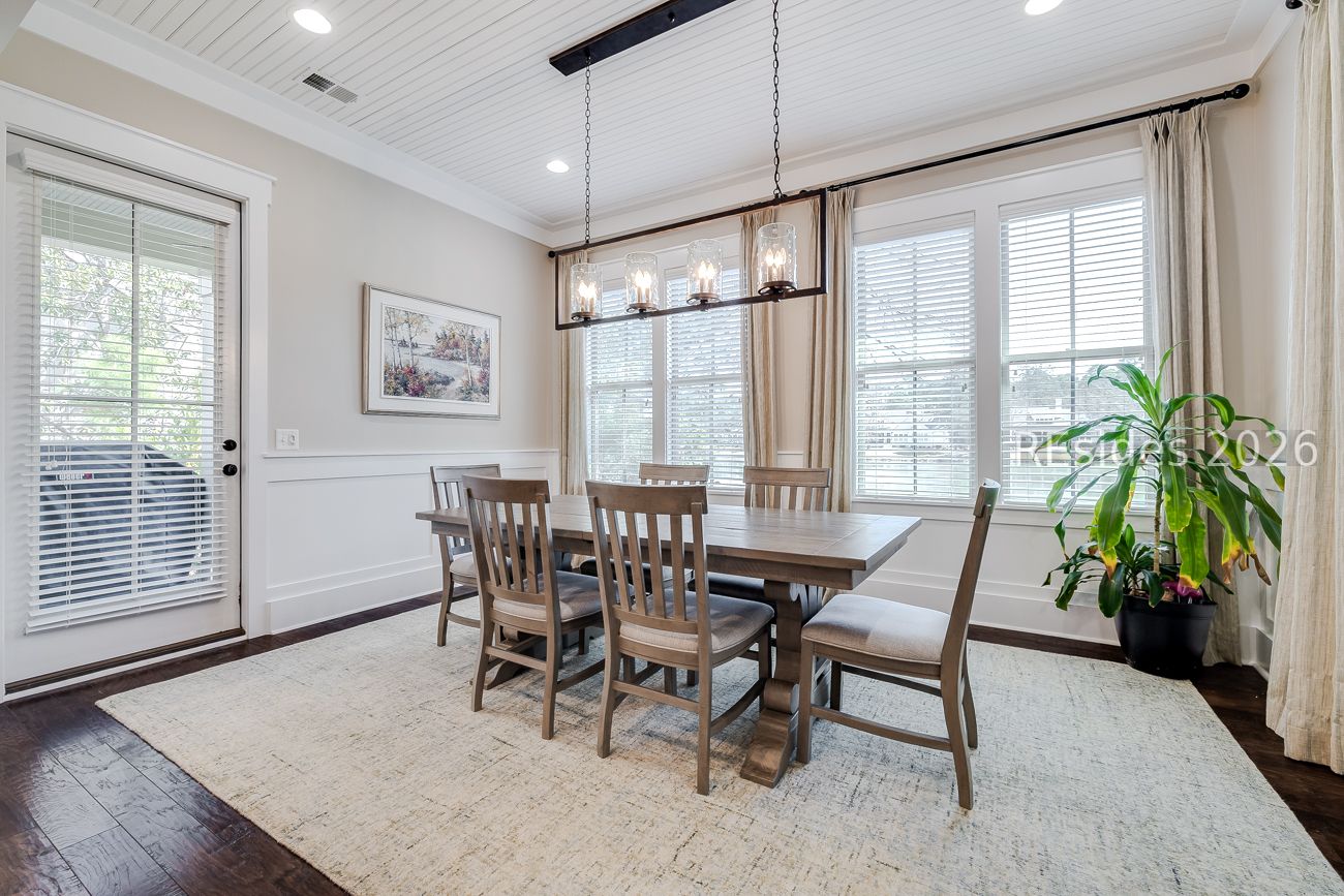 36 Oldfield Village Road Bluffton, SC 29909 - Photo 16 of 85 Dining area with side entrance to backyard