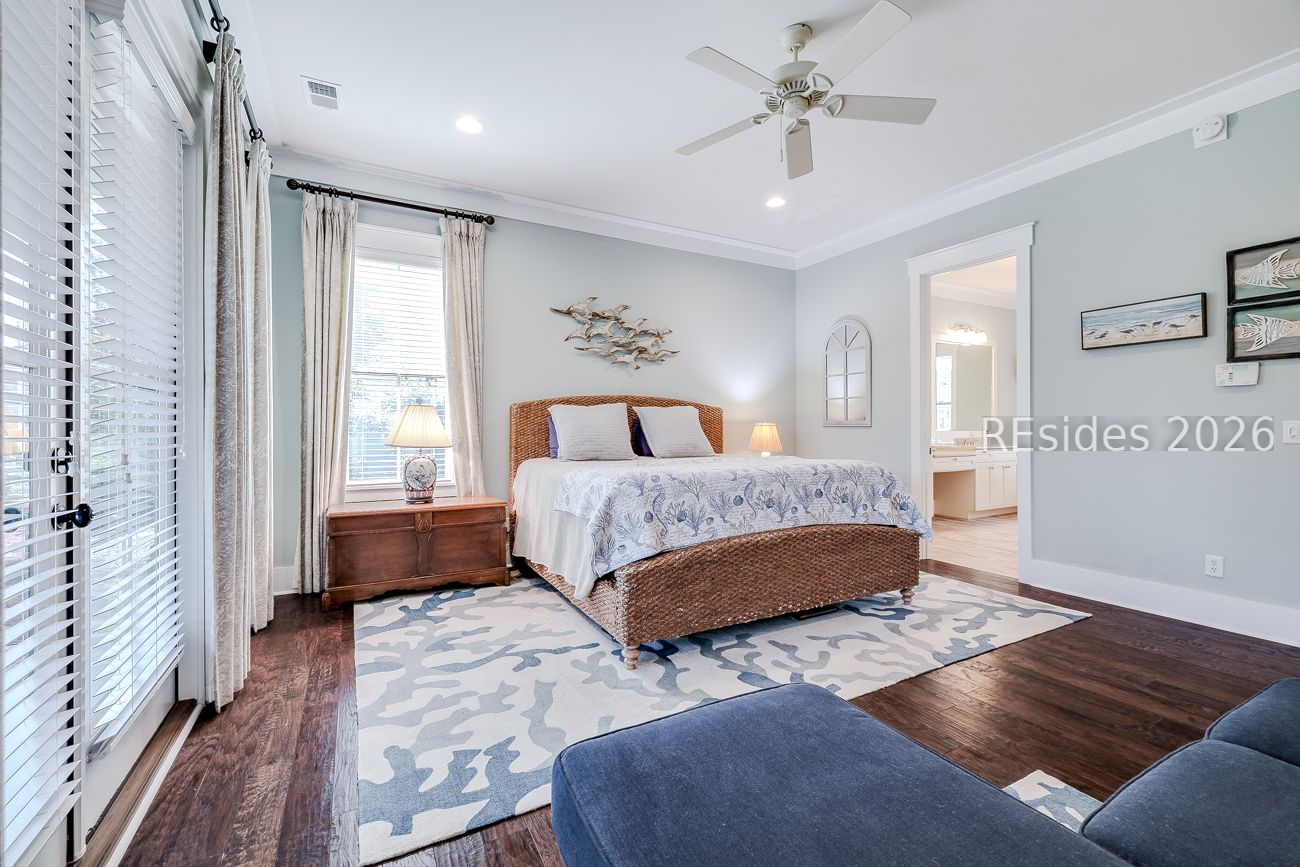 36 Oldfield Village Road Bluffton, SC 29909 - Photo 22 of 85 Spacious primary suite has lake views