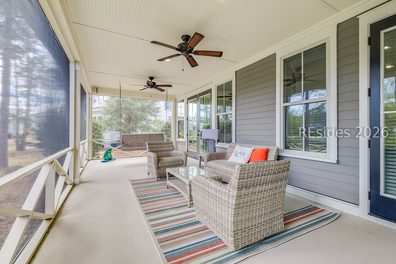 36 Oldfield Village Road Bluffton, SC 29909 - Photo 40 of 85 Enormous 36.3'x11.8' screened porch with swing