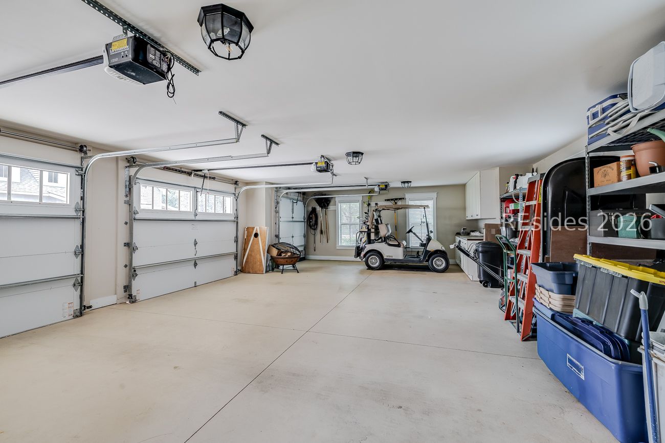 36 Oldfield Village Road Bluffton, SC 29909 - Photo 66 of 85 Large garage with cabinetry