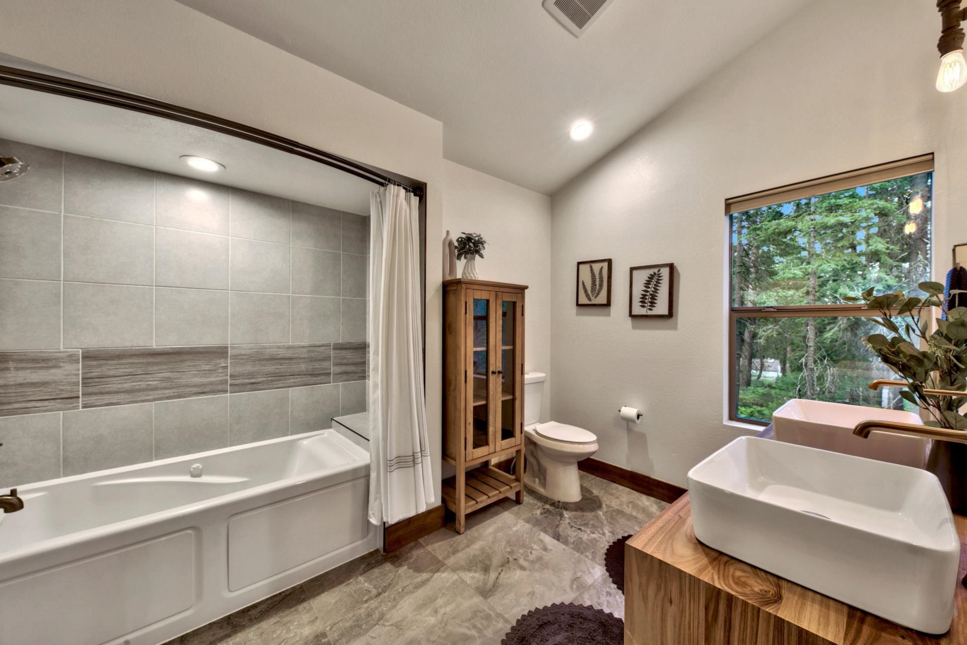 2675 Rustic Lane Tahoe City, CA 96141 - Photo 13 of 21 a spacious bathroom with a bathtub and toilet