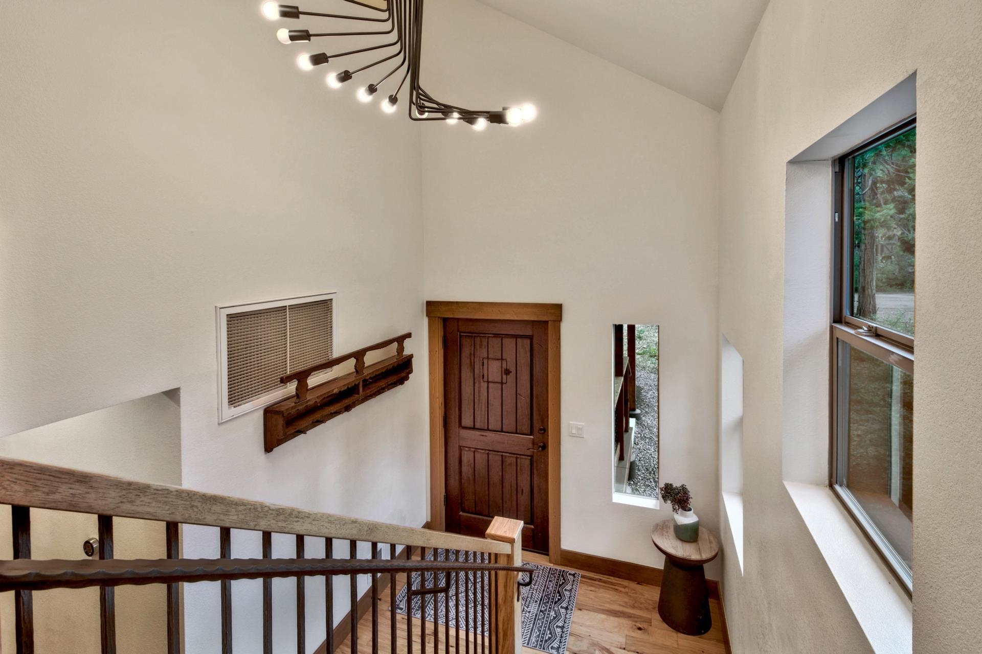 2675 Rustic Lane Tahoe City, CA 96141 - Photo 17 of 21 a view of a livingroom with wooden floor and stairs