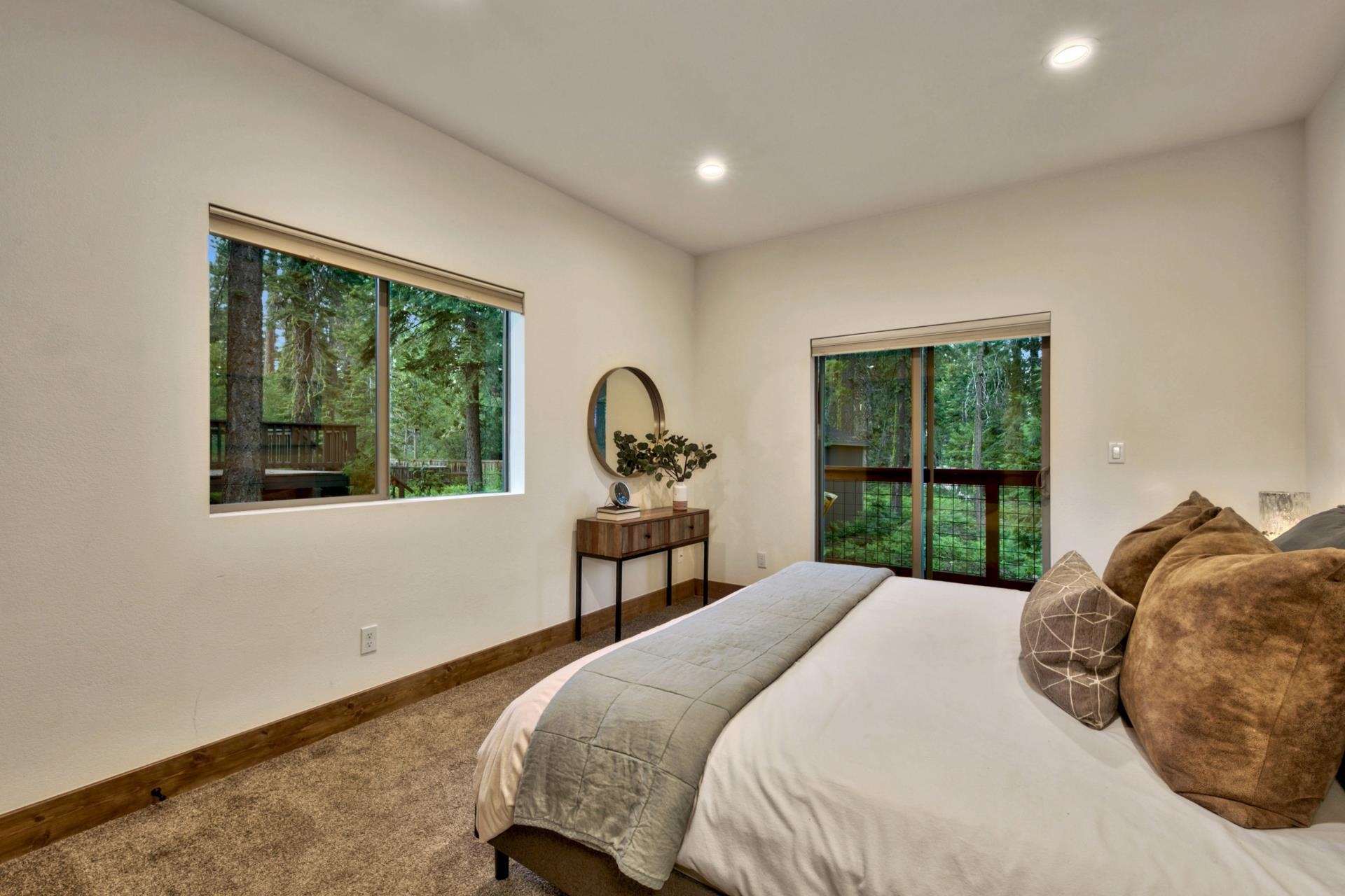 2675 Rustic Lane Tahoe City, CA 96141 - Photo 18 of 21 a bedroom with a bed and a window