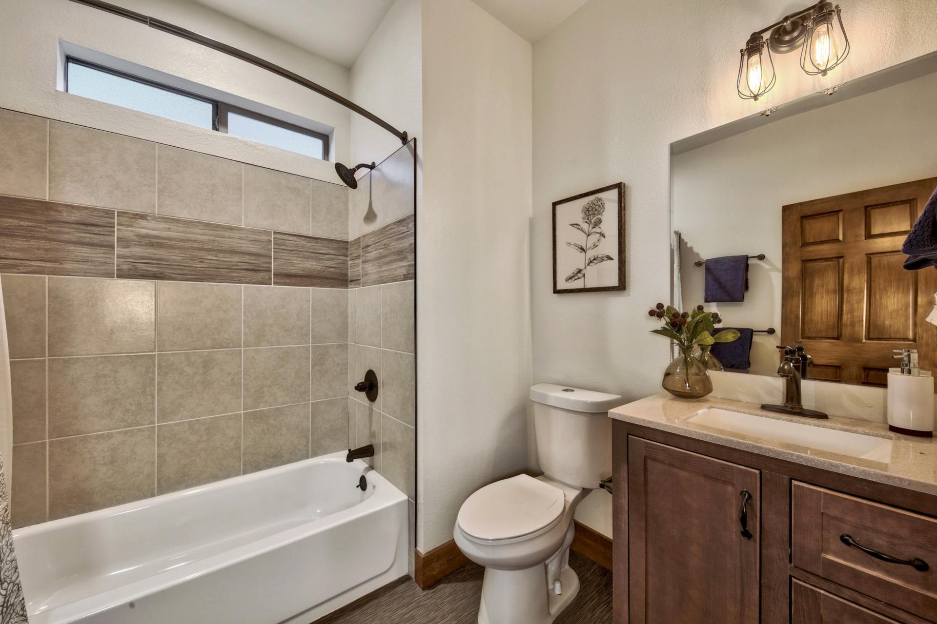 2675 Rustic Lane Tahoe City, CA 96141 - Photo 19 of 21 a bathroom with a sink toilet and shower