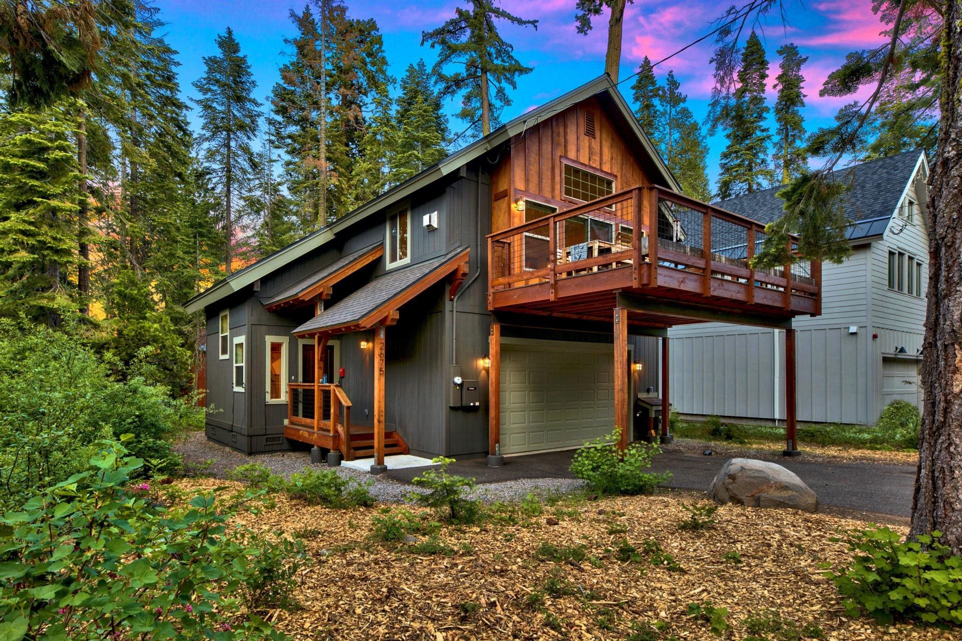 2675 Rustic Lane Tahoe City, CA 96141 - Photo 2 of 21 a view of a house with a yard and plants