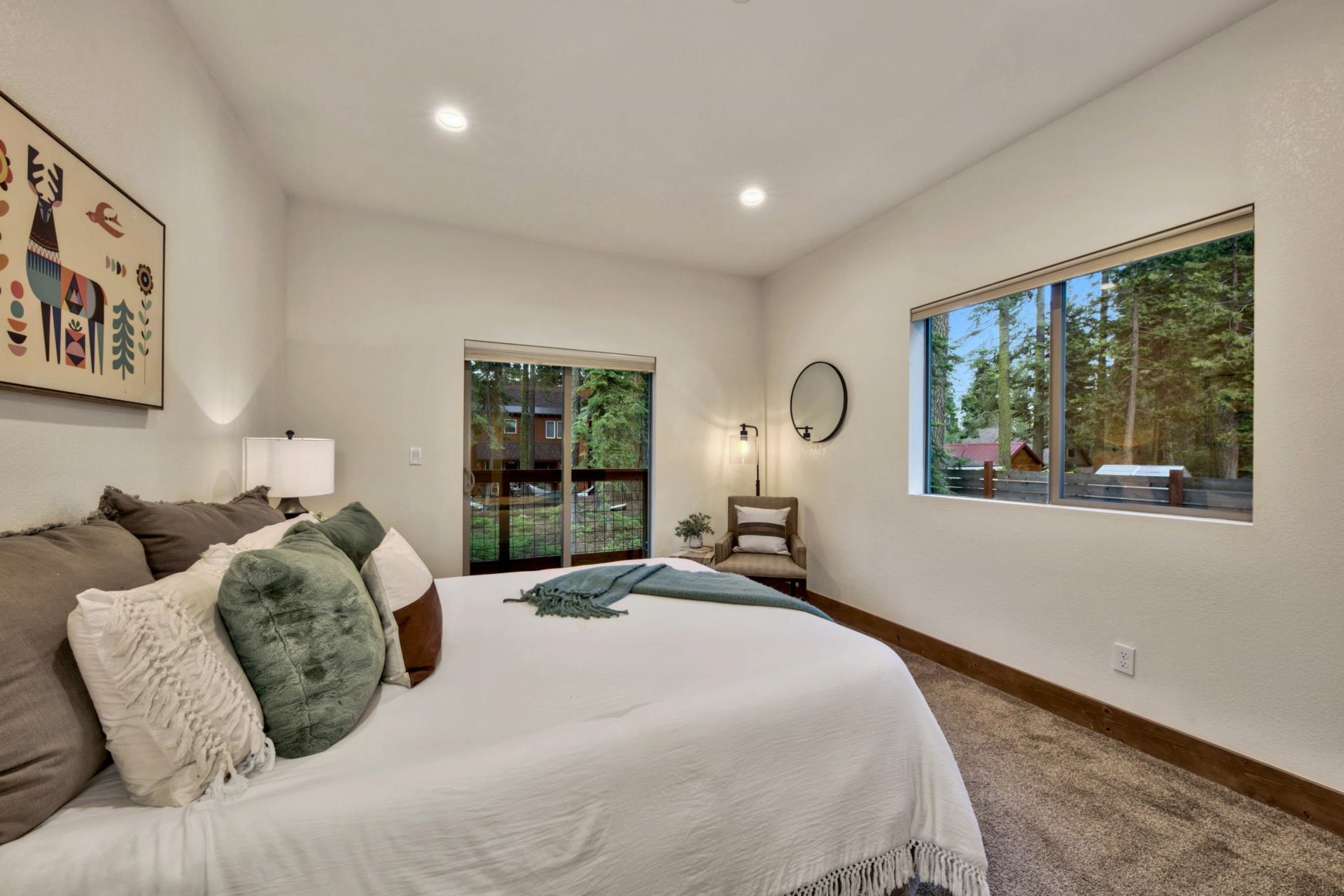 2675 Rustic Lane Tahoe City, CA 96141 - Photo 21 of 21 a bedroom with a large bed and a large window
