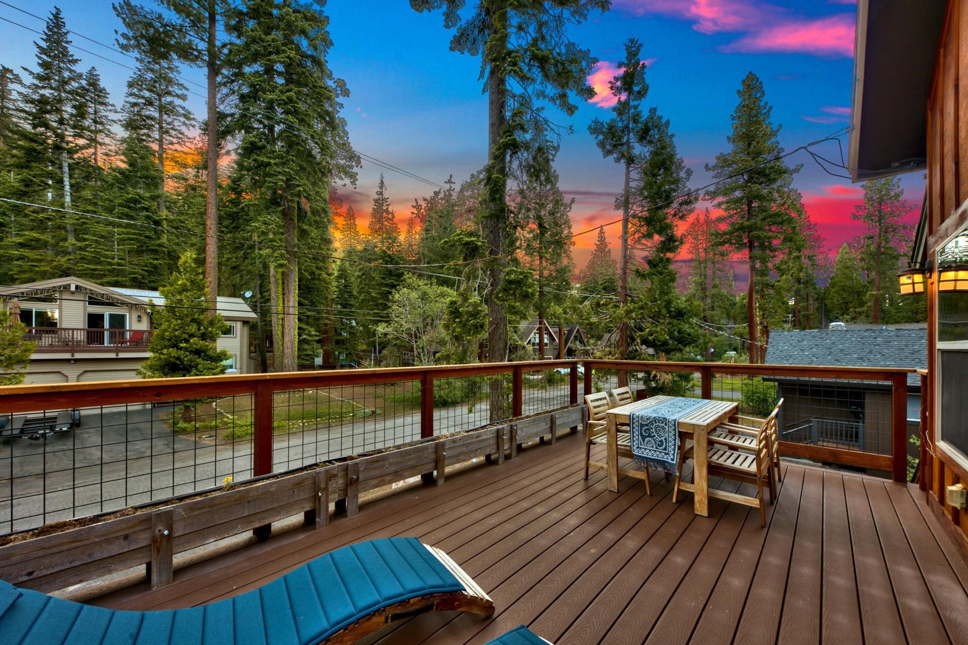2675 Rustic Lane Tahoe City, CA 96141 - Photo 10 of 21 a view of a balcony with wooden floor and outdoor seating
