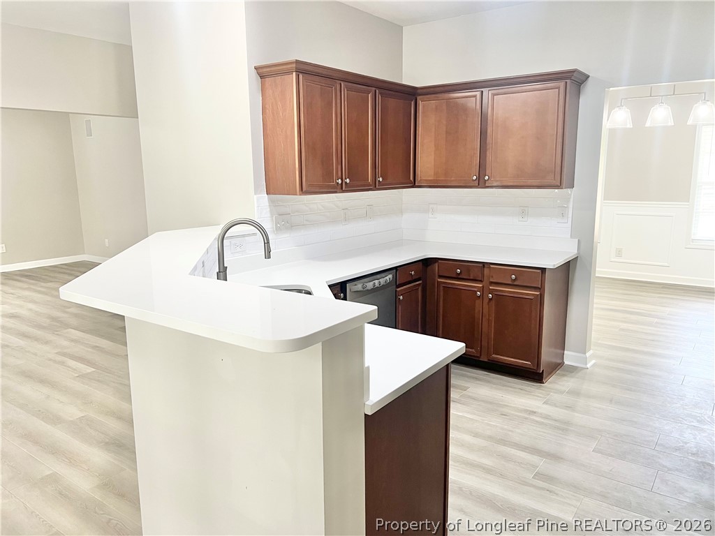 1523 Rough Rider Lane Parkton, NC 28371 - Photo 16 of 42 a kitchen with a sink cabinets and a window
