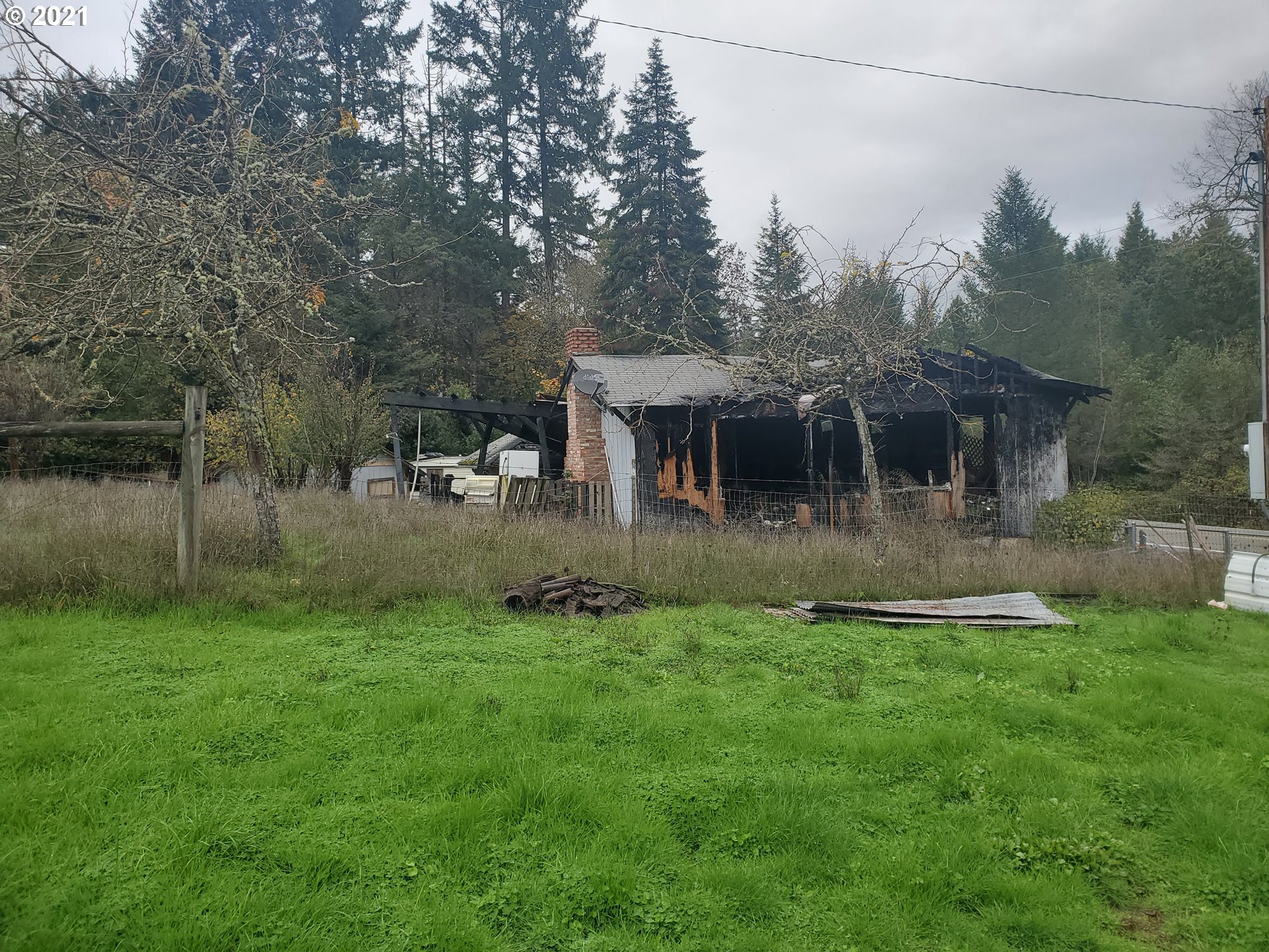 3047 Doerner Road Roseburg, OR 97471 - Photo 11 of 13 a view of a house with a backyard
