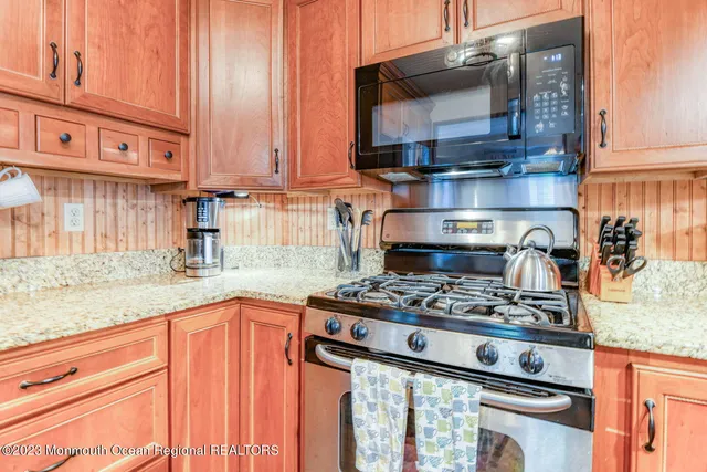 a bedroom with a bed and a cabinets