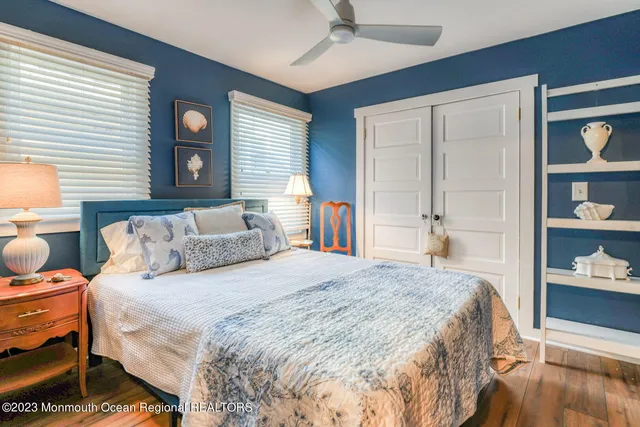 a bedroom with a bed and a closet