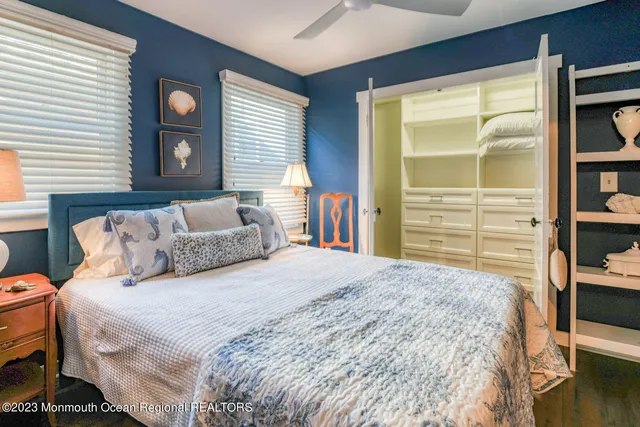 a bedroom with a bed and closet