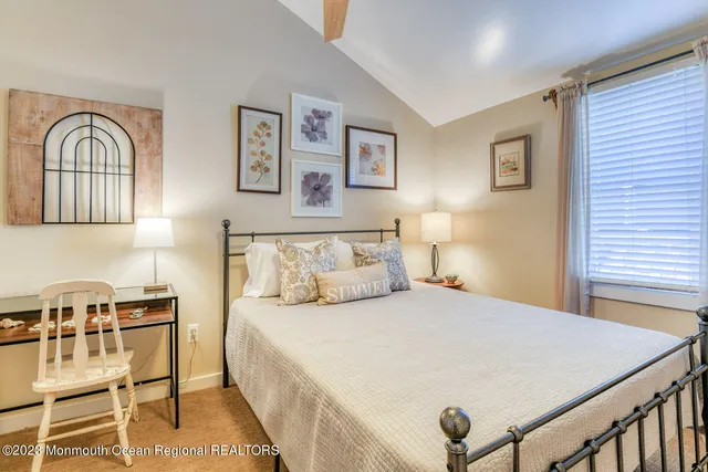 a living room with a couch and a table