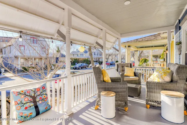 a outdoor living space with patio furniture and potted plants
