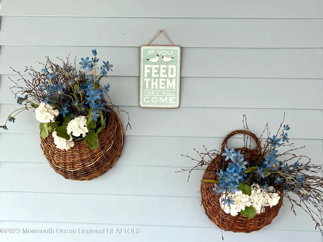 a view of a vase of flowers sitting on a table