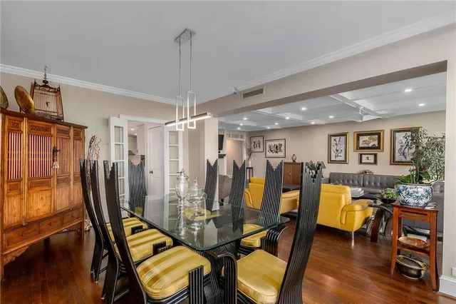a view of a livingroom with furniture and wooden floor