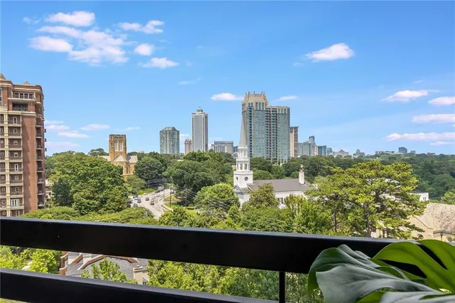 a view of balcony with furniture