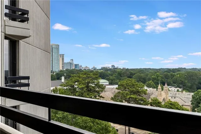 a view of a street with flower garden