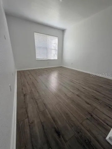 a bathroom with a sink a mirror and a shower