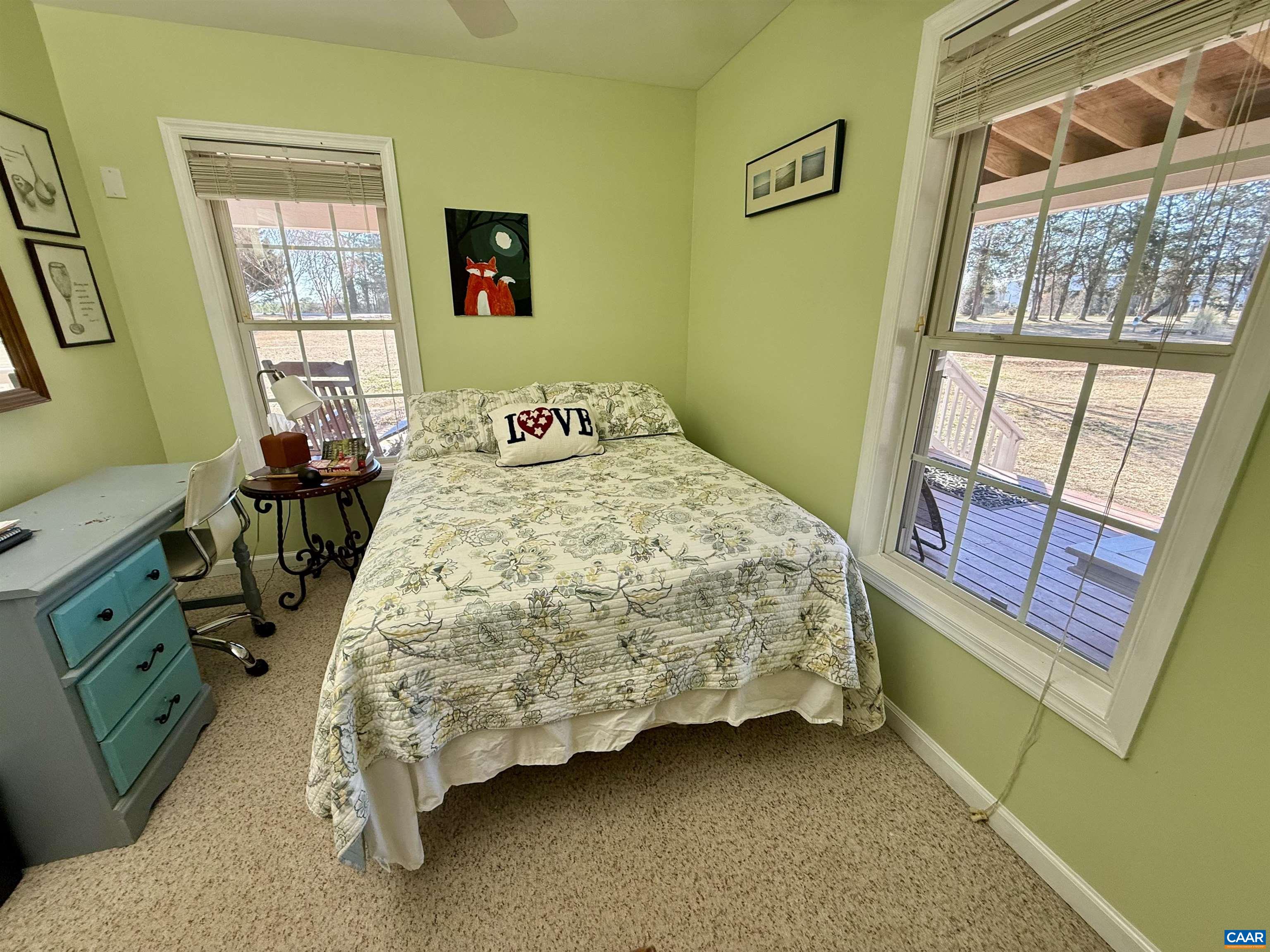 2019 Bybee Road Louisa, VA 23093 - Photo 24 of 47 a bed sitting in a bedroom next to a window