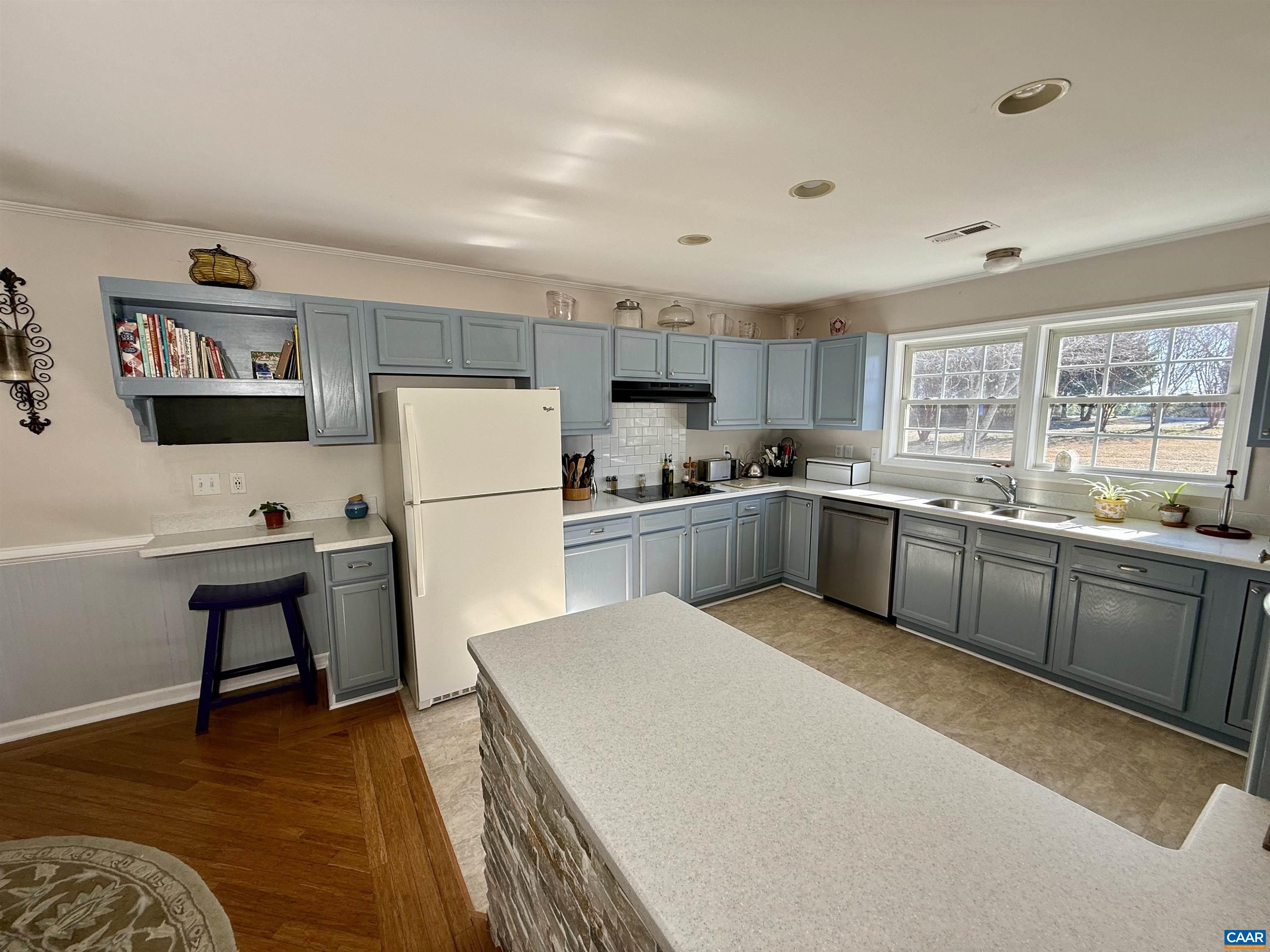 2019 Bybee Road Louisa, VA 23093 - Photo 9 of 47 a kitchen with a refrigerator a sink and a stove top oven