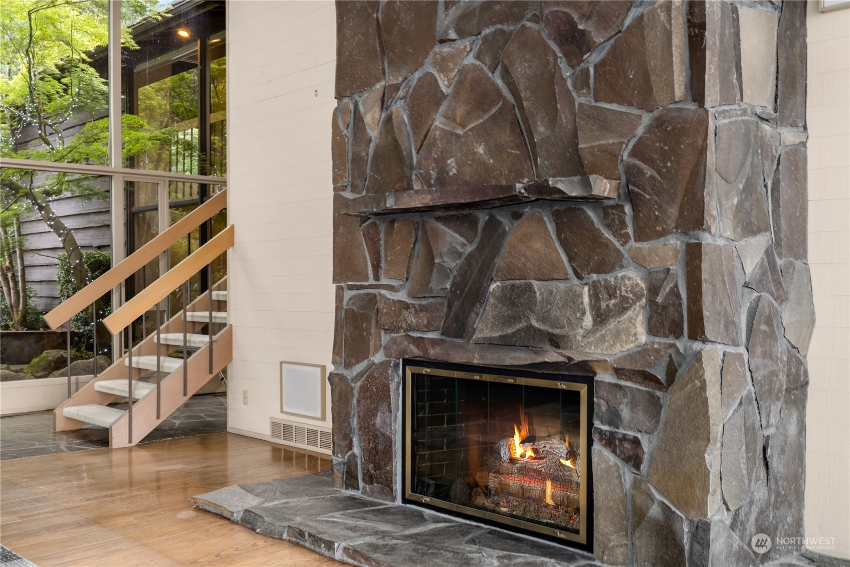 4232 Hunts Point Road Hunts Point, WA 98004 - Photo 17 of 23 a view of an entryway with wooden floor