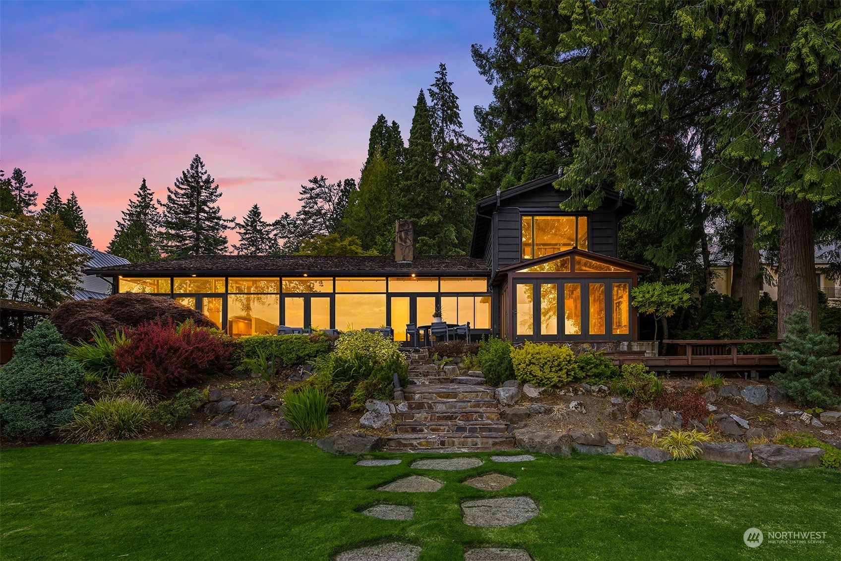 4232 Hunts Point Road Hunts Point, WA 98004 - Photo 4 of 23 a front view of a house with garden