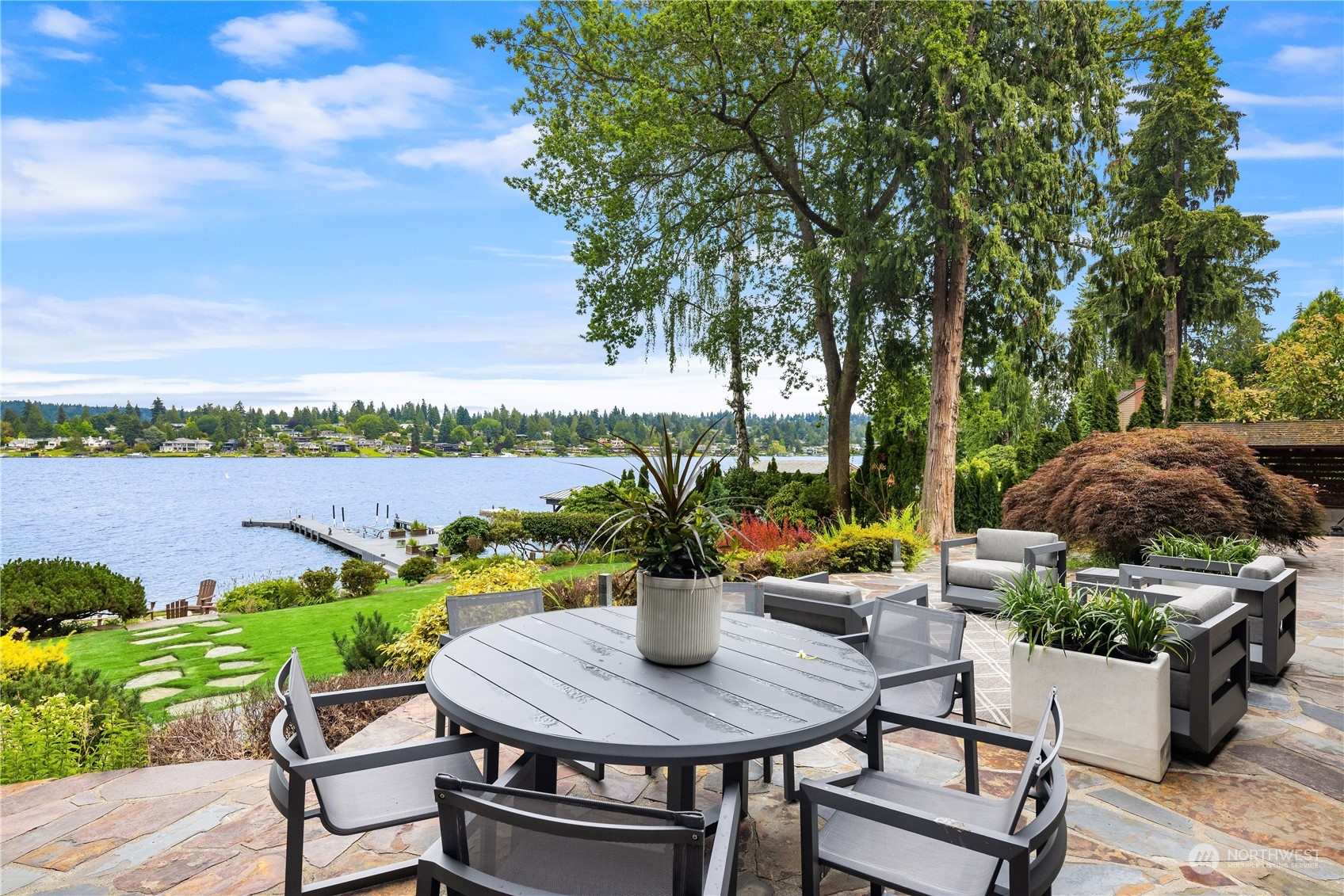 4232 Hunts Point Road Hunts Point, WA 98004 - Photo 9 of 23 a view of a chairs and table in patio
