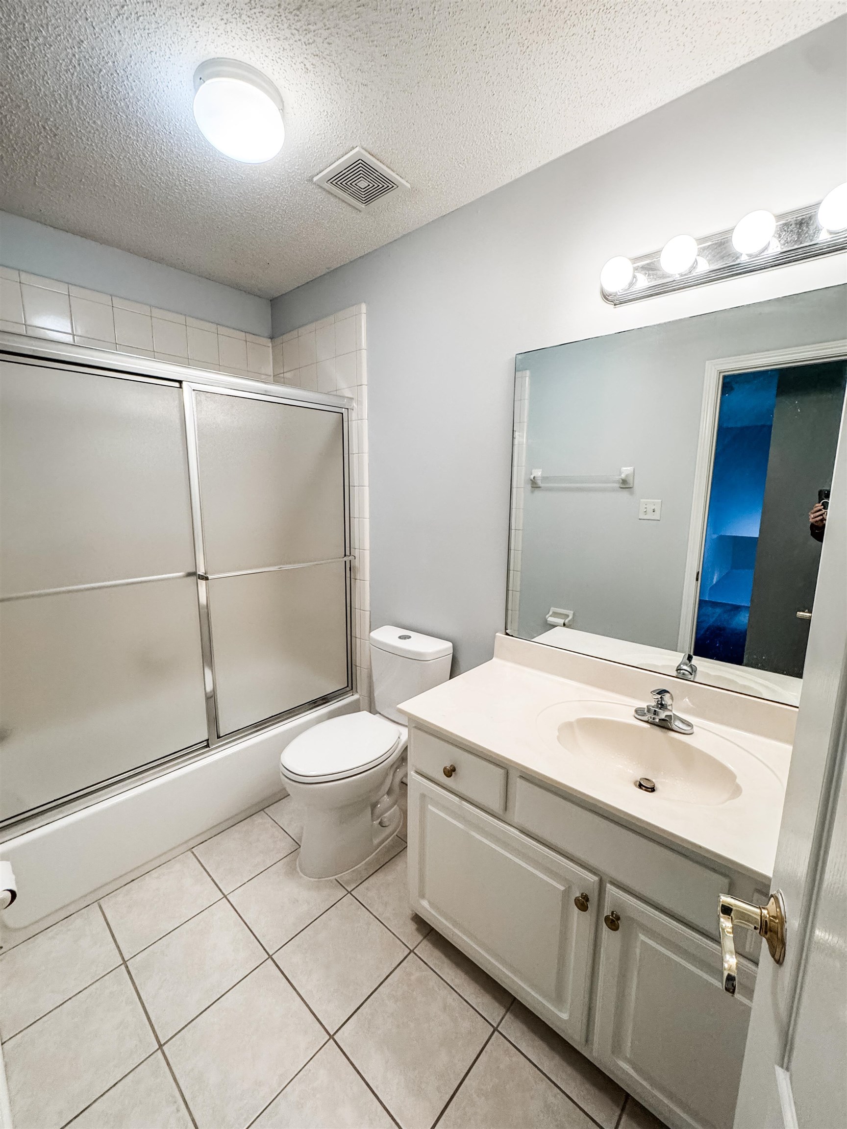 472 Hunters Mill Cove Collierville, TN 38017 - Photo 13 of 15 a bathroom with a toilet sink and a mirror
