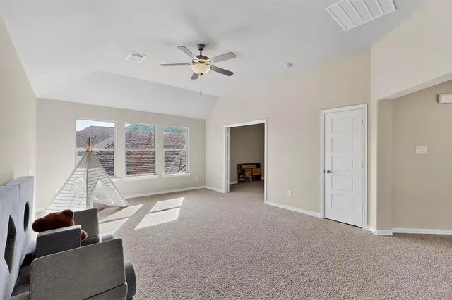 a bathroom with a toilet and a bathtub