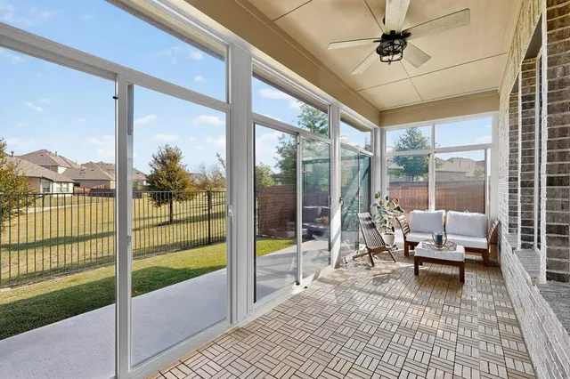 an empty room with air conditioner and windows