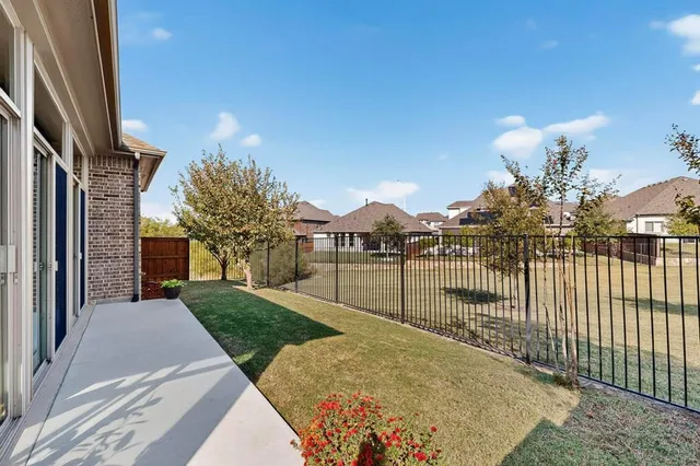 a view of cabinets and utility room with washer and dryer