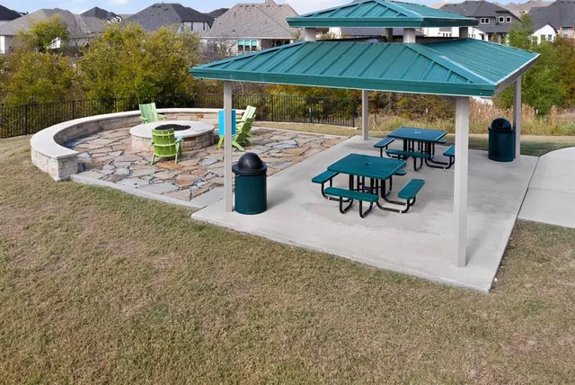 a view of a house with garden and porch