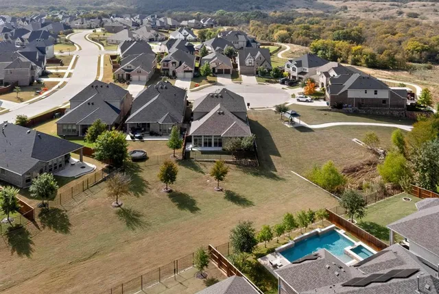 swimming pool view with a seating space