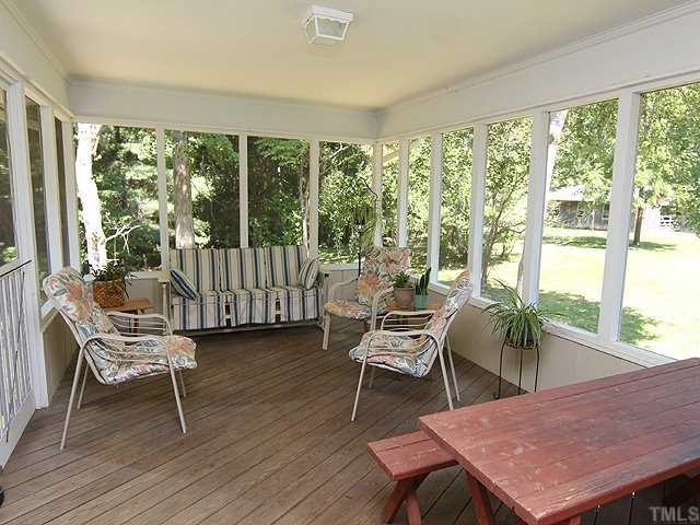 6120 New Sharon Church Road Rougemont, NC 27572 - Photo 10 of 12 a dining room with furniture and wooden floor